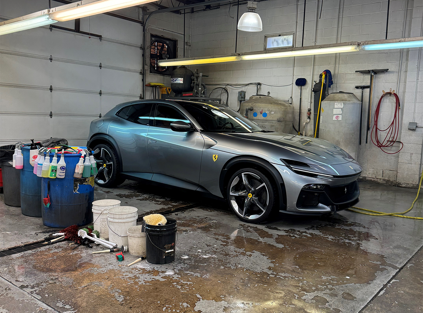 Silver sports car that just got washed in Philly